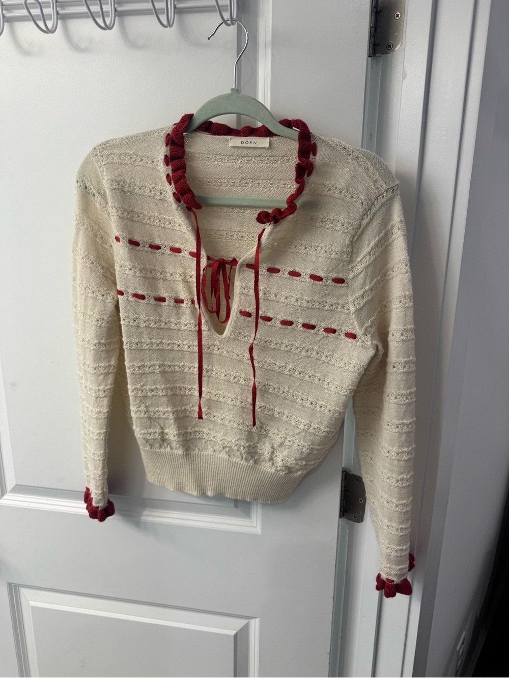 Doen Cream Knit Sweater with Red Trim and Tie Neck